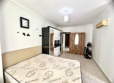 Меблированная двухкомнатная квартира, 80м² с удачной локацией в 500м от моря в Махмутларе, Алания ID-18309 фото-9