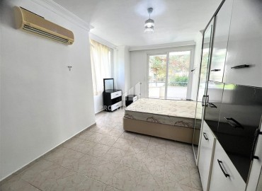 Меблированная двухкомнатная квартира, 80м² с удачной локацией в 500м от моря в Махмутларе, Алания ID-18309 фото-10