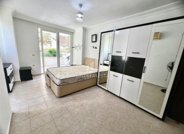 Меблированная двухкомнатная квартира, 80м² с удачной локацией в 500м от моря в Махмутларе, Алания ID-18309 фото-11