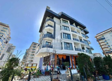 Укомплектованная квартира с одной спальней, 55м² с видом на горы в новом комплексе в Махмутларе, Алания ID-18310 фото-1