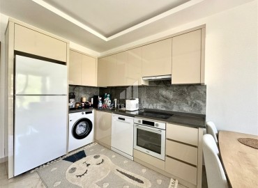 Укомплектованная квартира с одной спальней, 55м² с видом на горы в новом комплексе в Махмутларе, Алания ID-18310 фото-5