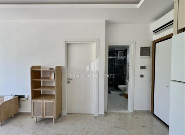 Укомплектованная квартира с одной спальней, 55м² с видом на горы в новом комплексе в Махмутларе, Алания ID-18310 фото-7