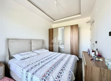 Укомплектованная квартира с одной спальней, 55м² с видом на горы в новом комплексе в Махмутларе, Алания ID-18310 фото-9