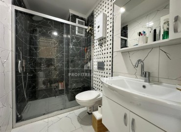 Укомплектованная квартира с одной спальней, 55м² с видом на горы в новом комплексе в Махмутларе, Алания ID-18310 фото-10