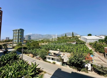 Укомплектованная квартира с одной спальней, 55м² с видом на горы в новом комплексе в Махмутларе, Алания ID-18310 фото-12