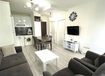 Недорогая квартира с одной спальней, 58м², в комплексе с бассейном и отличной локацией в Махмутларе, Алания ID-18312 фото-3