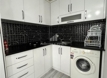 Недорогая квартира с одной спальней, 58м², в комплексе с бассейном и отличной локацией в Махмутларе, Алания ID-18312 фото-4