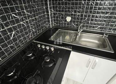 Недорогая квартира с одной спальней, 58м², в комплексе с бассейном и отличной локацией в Махмутларе, Алания ID-18312 фото-6