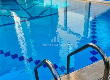 Недорогая квартира с одной спальней, 58м², в комплексе с бассейном и отличной локацией в Махмутларе, Алания ID-18312 фото-16