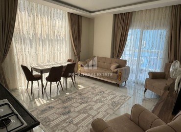 Меблированная двухкомнатная квартира, 65м², с остекленным балконом и видом на горы в в Махмутларе, Алания, 550м от моря ID-18315 фото-2