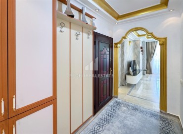 Двухкомнатная квартира, 75м², с дизайнерским и интерьером в доме городского типа в 600м от моря в центре Алании ID-18316 фото-13