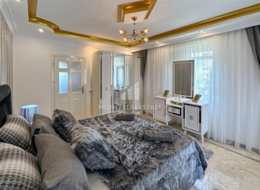 Двухкомнатная квартира, 75м², с дизайнерским и интерьером в доме городского типа в 600м от моря в центре Алании ID-18316 фото-14