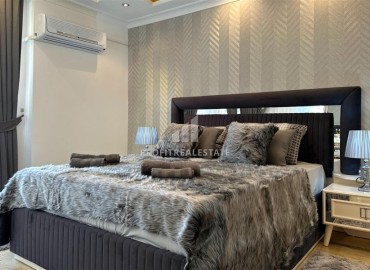 Двухкомнатная квартира, 75м², с дизайнерским и интерьером в доме городского типа в 600м от моря в центре Алании ID-18316 фото-17