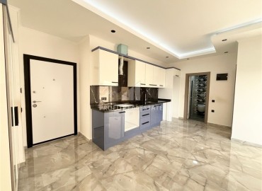 Апартаменты с одной спальней, 60м², в новом комплексе с инфраструктурой в 400м от моря в Махмутларе, Алания ID-18317 фото-3