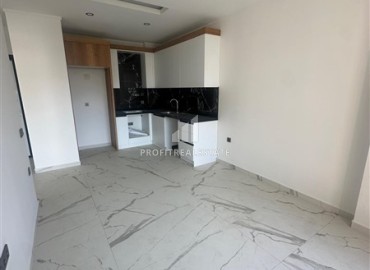 Двухкомнатная квартира, 58м², с чистовой отделкой в комплексе премиум класса в Авсалларе, Алания ID-18327 фото-2