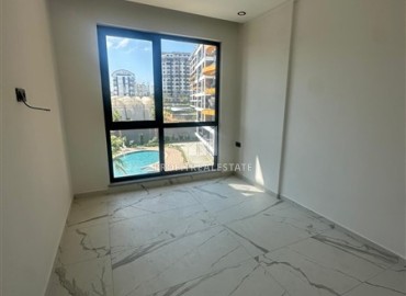 Двухкомнатная квартира, 58м², с чистовой отделкой в комплексе премиум класса в Авсалларе, Алания ID-18327 фото-3