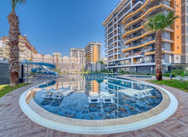 Двухкомнатная квартира, 58м², с чистовой отделкой в комплексе премиум класса в Авсалларе, Алания ID-18327 фото-9