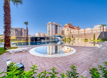 Двухкомнатная квартира, 58м², с чистовой отделкой в комплексе премиум класса в Авсалларе, Алания ID-18327 фото-10