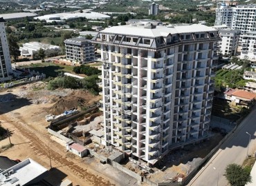 Двухкомнатные апартаменты, 51,3м², в элитном комплексе на этапе строительства, в Махмутларе, Алания ID-17654 фото-1