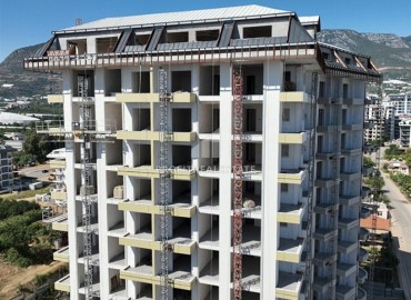 Двухкомнатные апартаменты, 51,3м², в элитном комплексе на этапе строительства, в Махмутларе, Алания ID-17654 фото-3