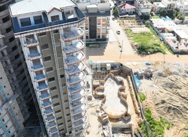 Двухкомнатные апартаменты, 51,3м², в элитном комплексе на этапе строительства, в Махмутларе, Алания ID-17654 фото-4