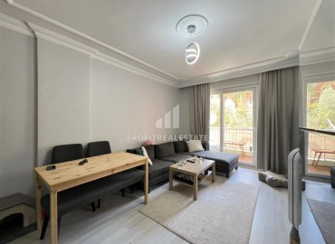 Двухкомнатная квартира, 45м², с ремонтом, в комплексе с парковкой в районе Анталии – Муратпаша, микрорайон Лара ID-18332 фото-3