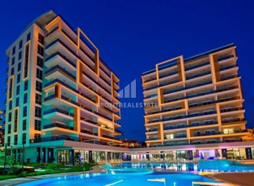 Стильная квартира с одной спальней, 65м², с потрясающим видом в элитном комплексе в районе Алании – Тосмур под ВНЖ ID-18333 фото-1