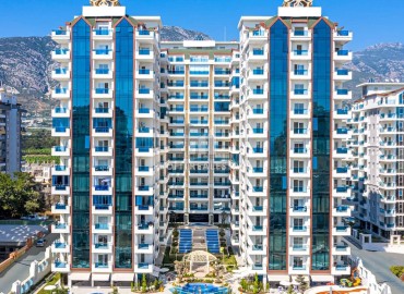 Апартаменты с одной спальней, 70м², в элитном комплексе, в 400 метрах от средиземноморских пляжей в Махмутларе, Алания ID-18338 фото-1