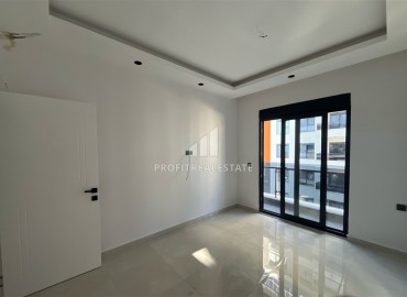 Квартира с одной спальней, 47м², в комплексе премиум класса на окончательном этапе строительства в центре Махмутлара ID-16584 фото-4