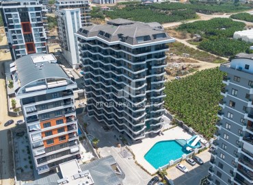 Квартира с одной спальней, 47м², в комплексе премиум класса на окончательном этапе строительства в центре Махмутлара ID-16584 фото-16