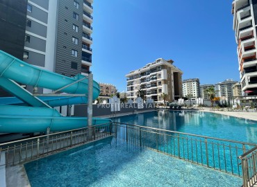 One-bedroom apartment at the final stage of construction, 400 m from the sea, in a new building with facilities, Mahmutlar, Alanya ID-16203 фото-8