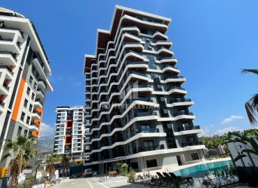 One-bedroom apartment at the final stage of construction, 400 m from the sea, in a new building with facilities, Mahmutlar, Alanya ID-16203 фото-11