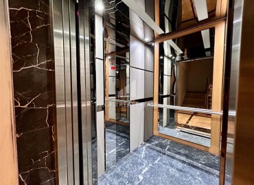 Двухкомнатные меблированные апартаменты, 56м², в комфортабельной новостройке в центре Махмутлара, Алания ID-18349 фото-12