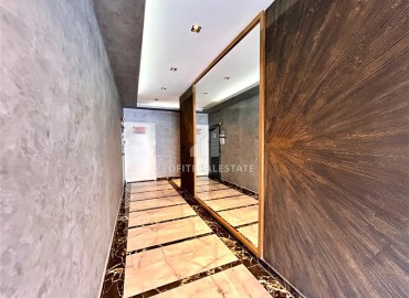 Двухкомнатные меблированные апартаменты, 56м², в комфортабельной новостройке в центре Махмутлара, Алания ID-18349 фото-14