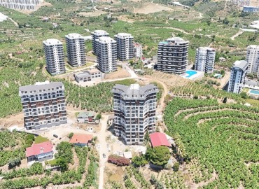 Трехкомнатные апартаменты, 90м², в комплексе премиум класса на этапе строительства в Махмутларе, в 850м от моря, Алания ID-18362 фото-12