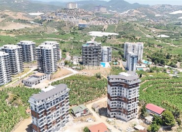 Трехкомнатные апартаменты, 90м², в комплексе премиум класса на этапе строительства в Махмутларе, в 850м от моря, Алания ID-18362 фото-13