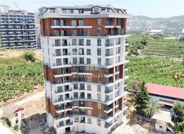 Трехкомнатные апартаменты, 90м², в комплексе премиум класса на этапе строительства в Махмутларе, в 850м от моря, Алания ID-18362 фото-15