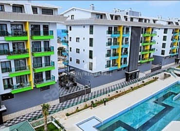 Элегантная квартира с двумя спальнями, 85м², с видом на море в новом комплексе премиум класса в Каргыджаке, Алания ID-18363 фото-1