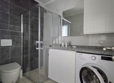 Элегантная квартира с двумя спальнями, 85м², с видом на море в новом комплексе премиум класса в Каргыджаке, Алания ID-18363 фото-9