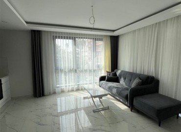 Апартаменты с одной спальней, 65м², в комфортабельной новостройке в центре Алании с потрясающим расположением ID-18364 фото-4