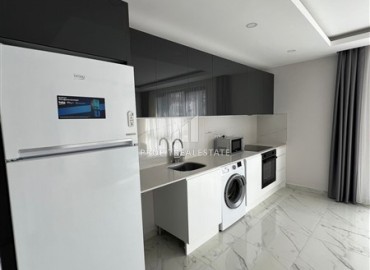 Апартаменты с одной спальней, 65м², в комфортабельной новостройке в центре Алании с потрясающим расположением ID-18364 фото-5