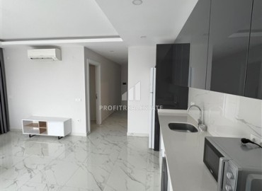 Апартаменты с одной спальней, 65м², в комфортабельной новостройке в центре Алании с потрясающим расположением ID-18364 фото-6