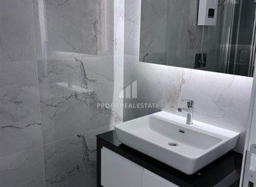 Апартаменты с одной спальней, 65м², в комфортабельной новостройке в центре Алании с потрясающим расположением ID-18364 фото-10