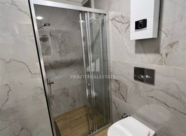 Апартаменты с одной спальней, 65м², в комфортабельной новостройке в центре Алании с потрясающим расположением ID-18364 фото-11