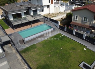 Новая частная вилла с четырьмя спальнями, 350м², с бассейном и садом под гражданство, Кемер, Анталия ID-18372 фото-1