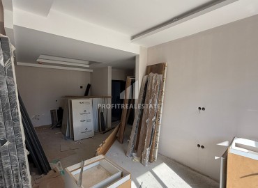 Апартаменты 1+1, 70м², в элитном комплексе на окончательном этапе строительства в районе Томюк, Эрдемли ID-18375 фото-8