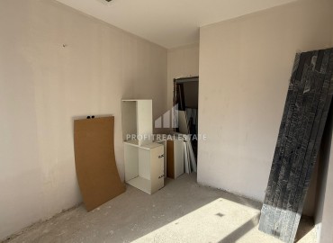 Апартаменты 1+1, 70м², в элитном комплексе на окончательном этапе строительства в районе Томюк, Эрдемли ID-18375 фото-9