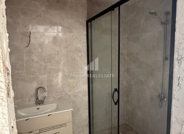 Апартаменты 1+1, 70м², в элитном комплексе на окончательном этапе строительства в районе Томюк, Эрдемли ID-18375 фото-11