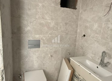 Апартаменты 1+1, 70м², в элитном комплексе на окончательном этапе строительства в районе Томюк, Эрдемли ID-18375 фото-13