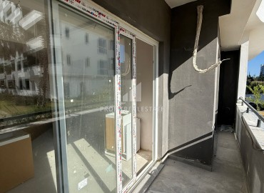 Апартаменты 1+1, 70м², в элитном комплексе на окончательном этапе строительства в районе Томюк, Эрдемли ID-18375 фото-16